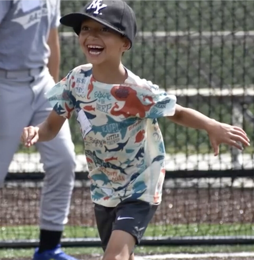 Child Smiles at World Baseball Academy Fort Wayne
